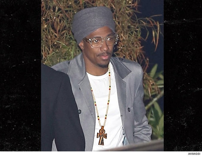 Nick Cannon in a grey turban